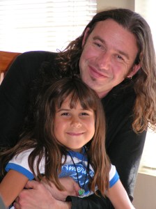 Long-haired dude with daughter