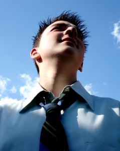 Young man against sky